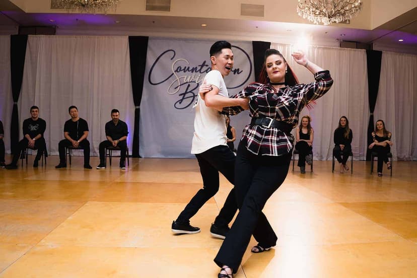 Two dancers competing in West Coast Swing at Countdown Swing Boston