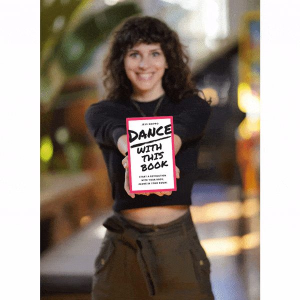 Jess Grippo holding her book, Dance With This Book